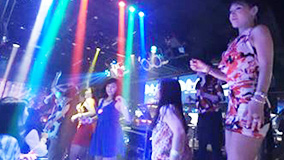  Revelers dance at a disco (a symbol of the bubble era).