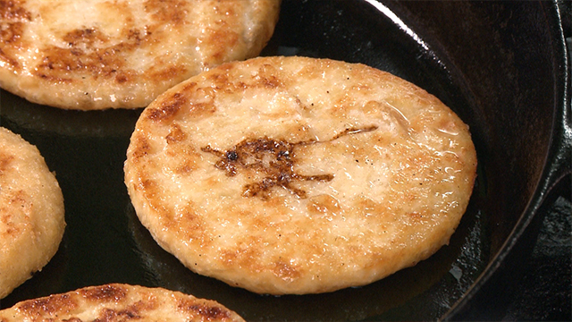 The buns are made of mashed tofu and yam. They're shaped into patties that are deep-fried and seasoned with umami-rich dashi.
