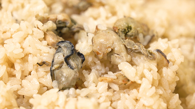The rice is cooked in a stock made from oysters and konbu kelp. It’s infused with the flavor and aroma of oysters.
