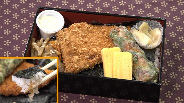 The nori-ben is packed with chikuwa fritters, fried fish, tamagoyaki, and sweet and savory simmered vegetables. The nori underneath can barely be seen! Underneath the nori is an umami-rich layer of katsuobushi and soy sauce. Every bite of this nori-ben is filled with the scent of the ocean.
